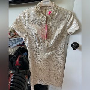 New with tags. Beautiful dress. I bought it and never wore it.